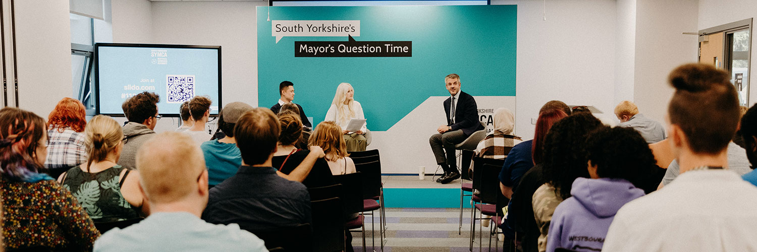 Mayor Oliver Coppard sat in front of college audience