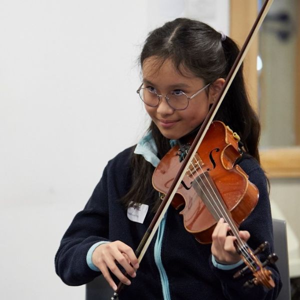 Child playing violin