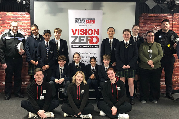 Police officers and students at Vision Zero Campaign Event
