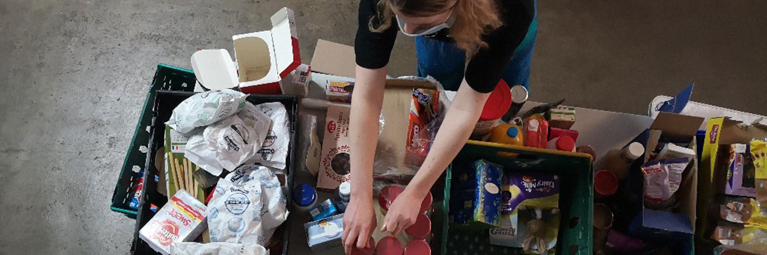 Lady working in a foodbank
