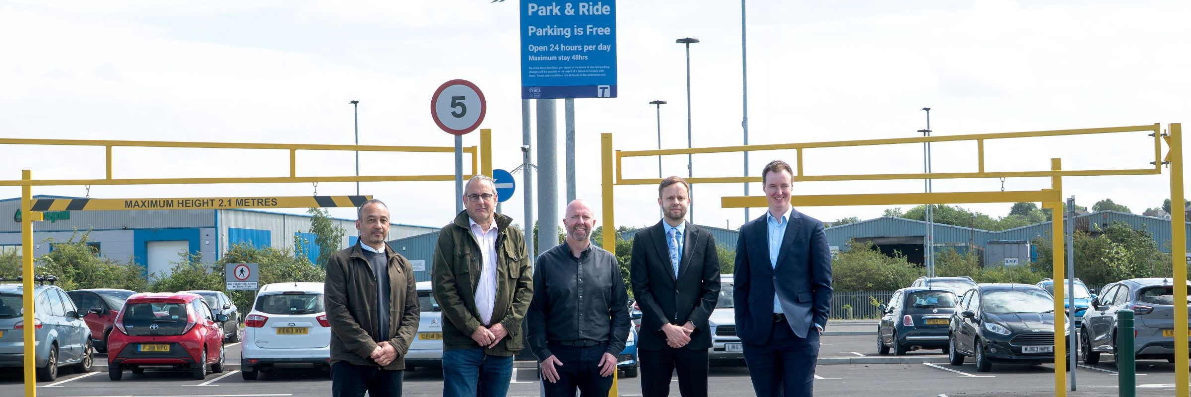 Project team standing at Parkgate Park and Ride