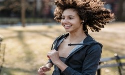 A young black girl running