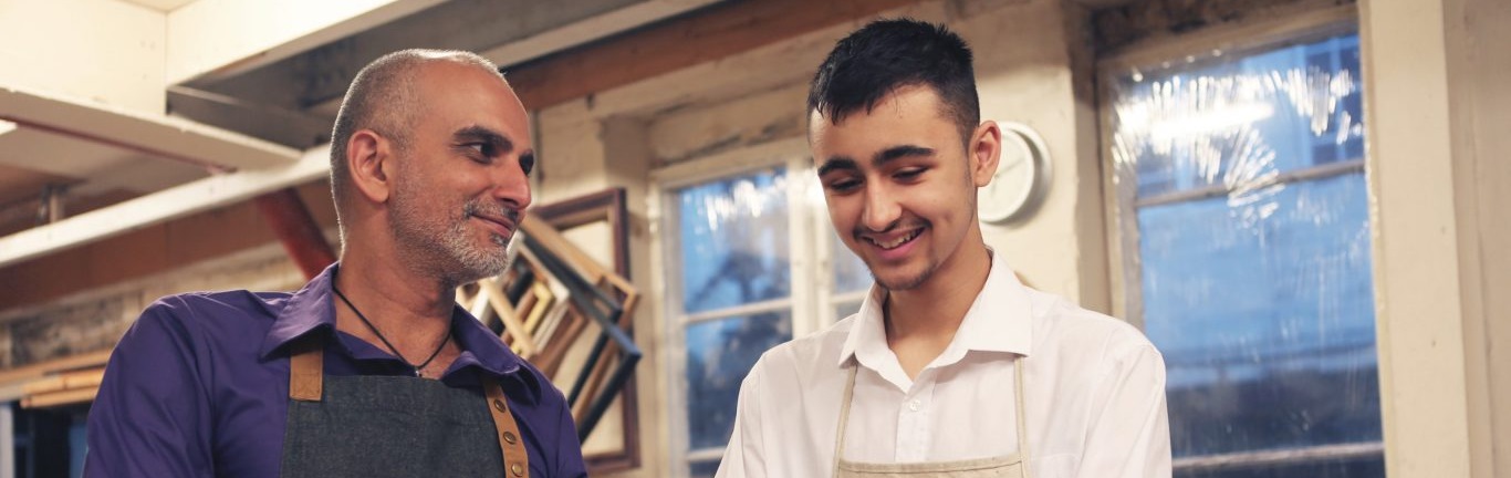 Apprentice and mentor talking