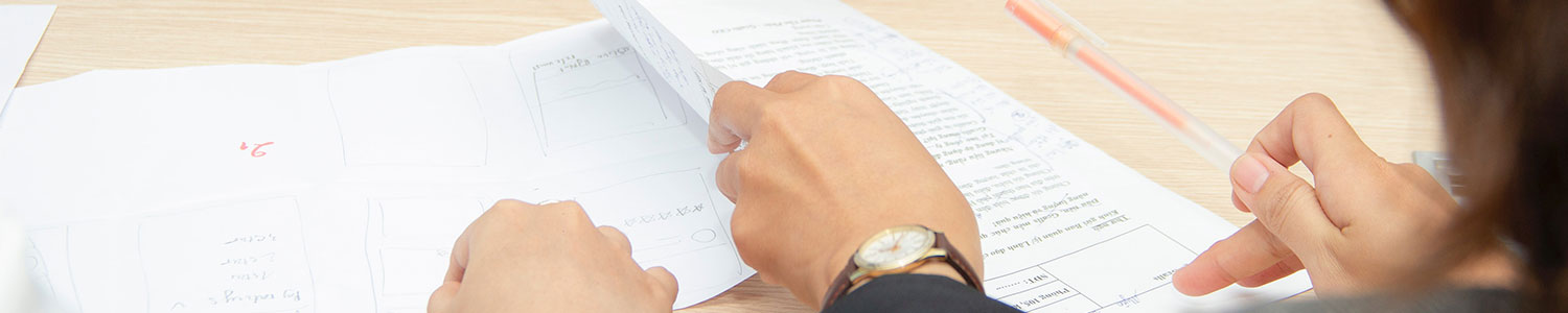 People looking at documents
