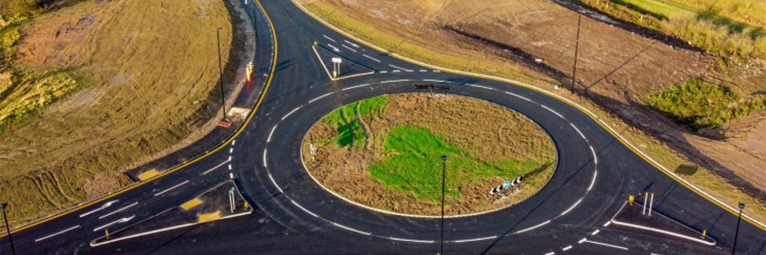 Aerial view of a newly constructed roundabout and connecting roads
