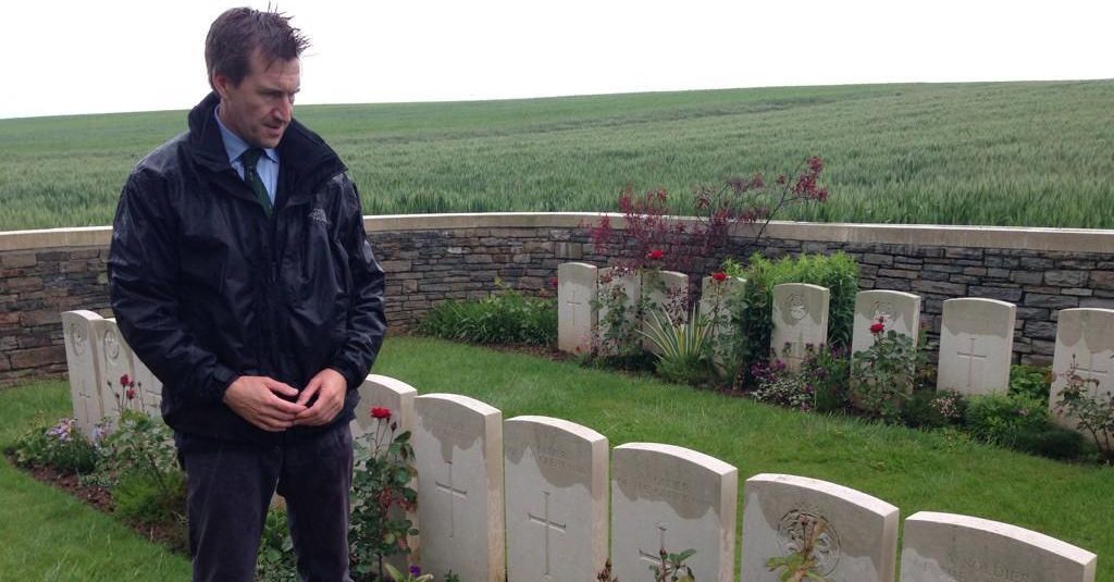 Dan Jarvis looking over cemetery 