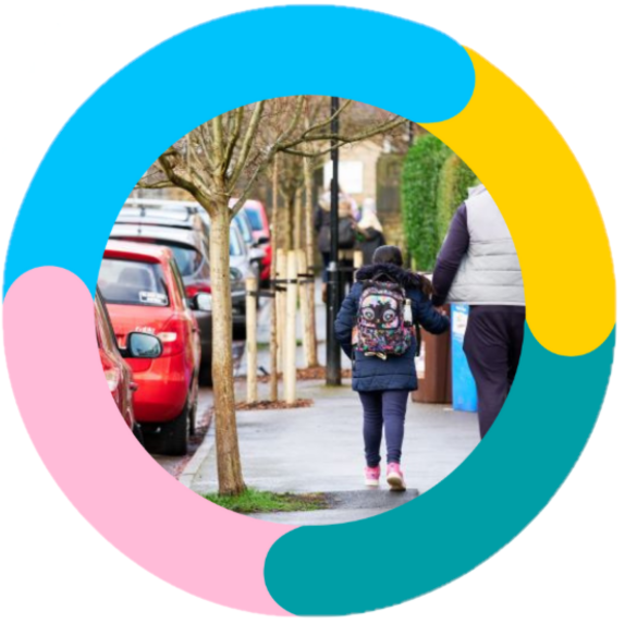 Girl walking with adult