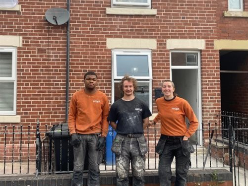 The retrofit installation team at the Let Zero show home