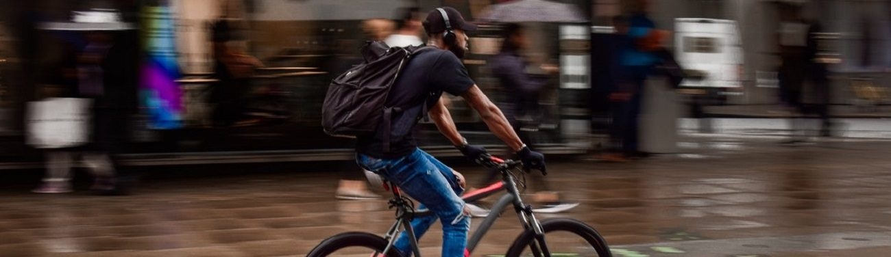 commuter cycling through town