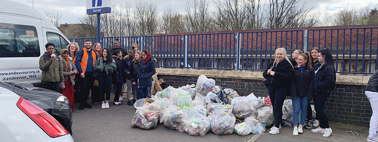 Transport Staff with local youngsters