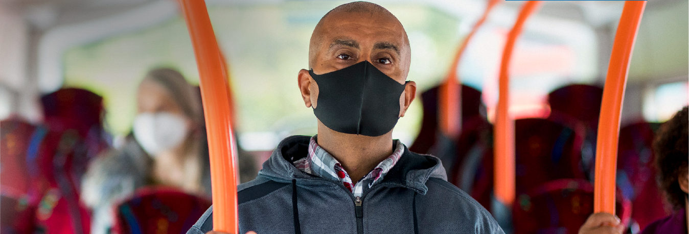 man wearing face mask on board