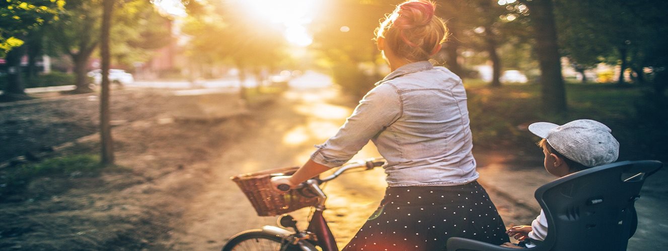 Woman with her son a bike 