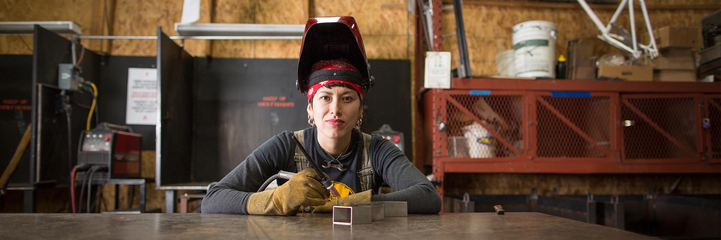 A lady sitting in the workshop
