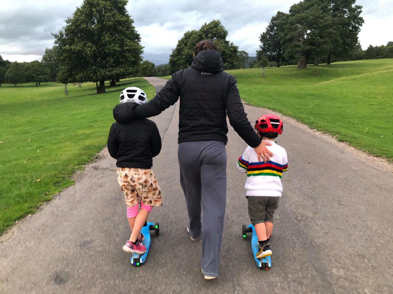 Parent walking with children
