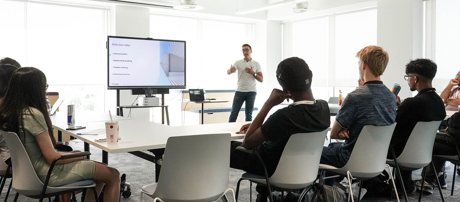 Students listening to a workplace skills and careers presentation during an employer-led learning session.